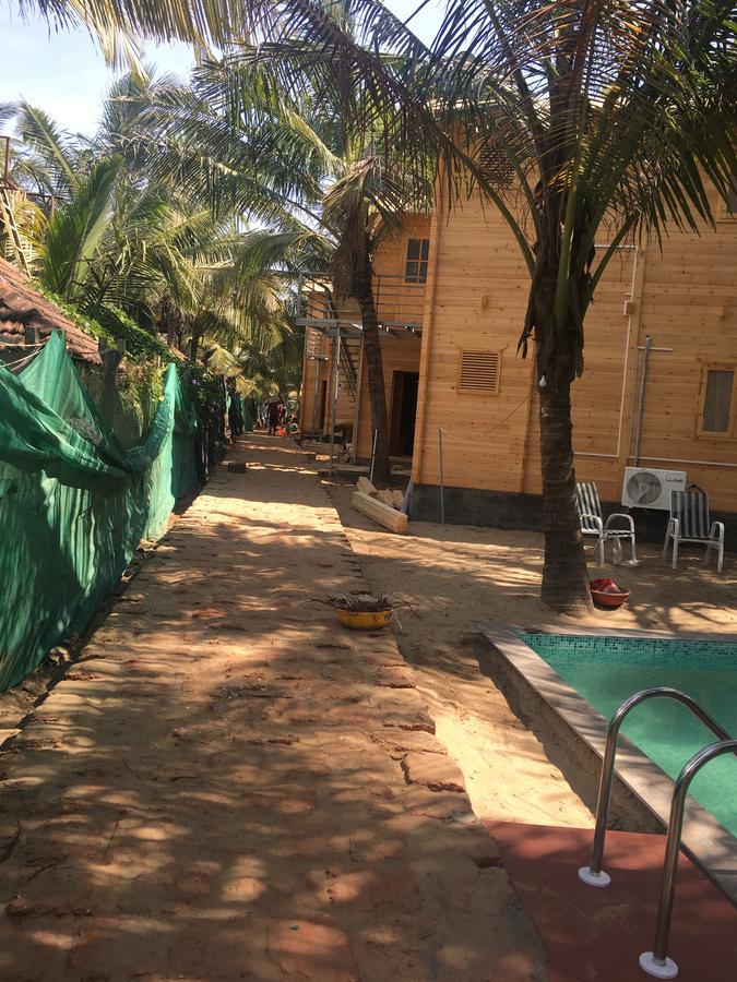 Tiara Fiesta Beach Cottages Morjim Buitenkant foto