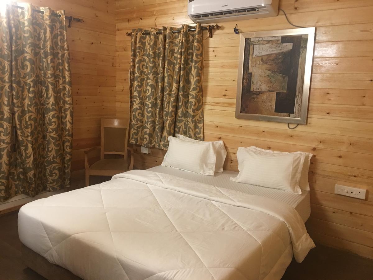Tiara Fiesta Beach Cottages Morjim Buitenkant foto