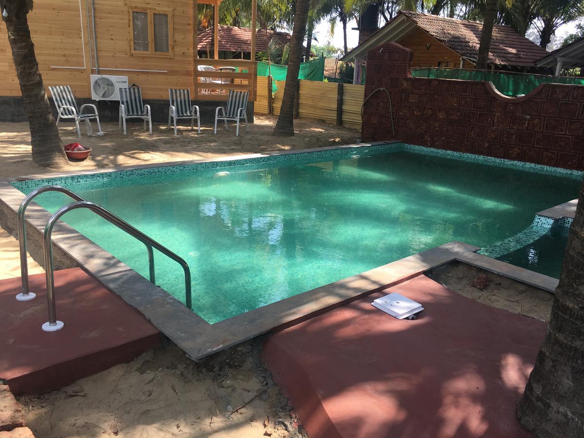 Tiara Fiesta Beach Cottages Morjim Buitenkant foto